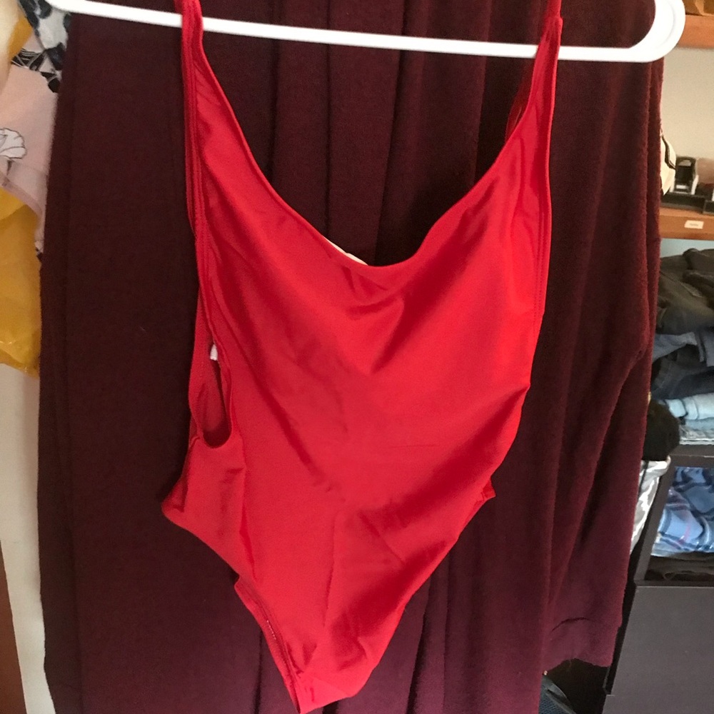 Red “bay watch” style suit